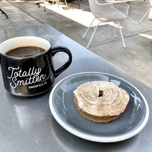 Black drip coffee and gluten free donut