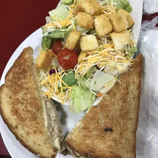 a sandwich and salad on a plate