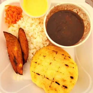 a meal in a styrofoam container