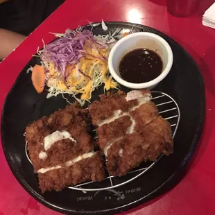Fried chicken cutlets with cheese (comes with a side of rice)