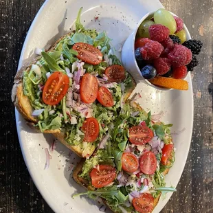 Avocado toast with fresh fruit.