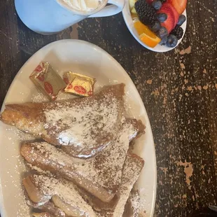 Fresh Seasonal Fruit + 4 Halves French Toast