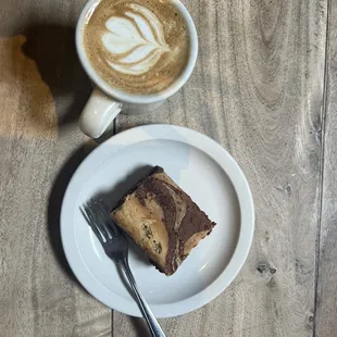 a piece of cake and a cup of coffee