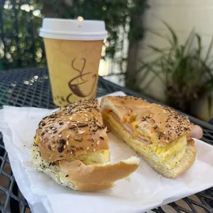 a breakfast sandwich and a cup of coffee