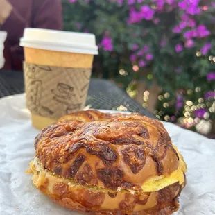 Bacon, egg and cheese on Asiago cheese bagel.