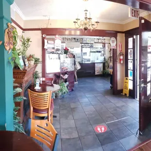 The entry and ordering/kitchen area