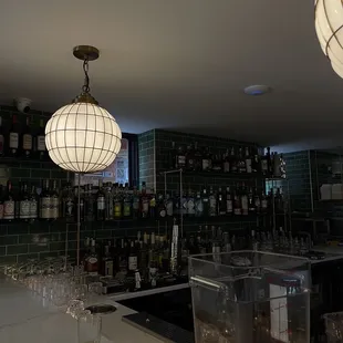 a bar with a lot of bottles