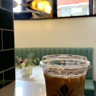 Iced latte with floral syrup || @hangry_detroiter