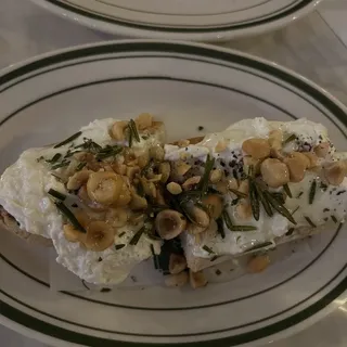 Ricotta Crostini, Truffle Honey, Hazelnut, Rosemary.