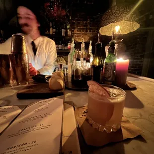 a man sitting at a bar