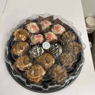 Tray of gourmet cupcakes. Call and place your order for your next event.