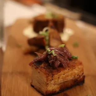 a piece of meat on a cutting board