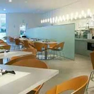 the interior of a modern restaurant