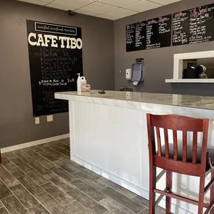the counter and chairs in the restaurant