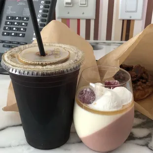 a cup of coffee and a dessert