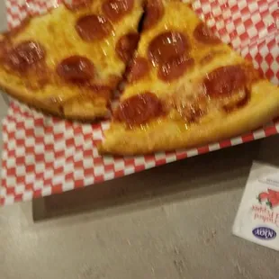 a slice of pepperoni pizza
