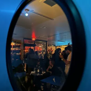 a group of people sitting at tables