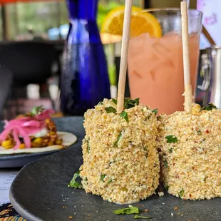 STREET CORN (2)  charred corn, lime, mayo, tajin, queso cotija