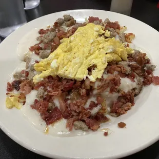 Country Debris......bacon, sausage, hash browns, biscuits, gravy, and pancakes on the side