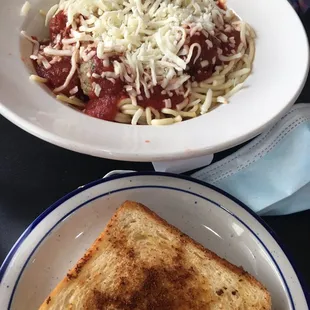 Spaghetti and Meatballs with garlic bread. Generous portion!