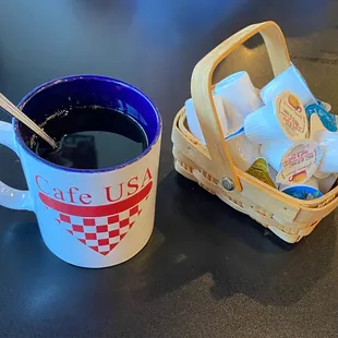 Coffee with basket of assorted creamers