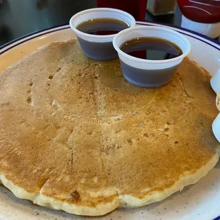Pancake size of the plate! Wow! Yum!