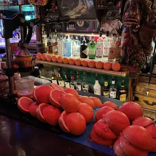 a display of oranges and liquor