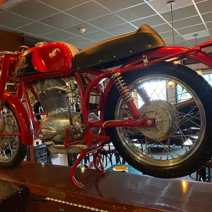 Cafe Veloce bike 1966 Motobi 250cc on display with 3 other bikes there.