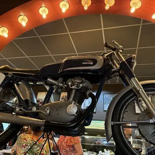 Italian motorcycles decorate the walls and ceiling