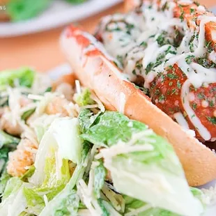 Meatball Sandwich and Caesar Salad