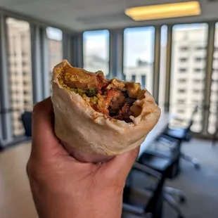 breakfast burrito with sausage, + avocado &amp; sour cream $1.50 = $10.95