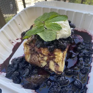 a piece of blueberry cheesecake