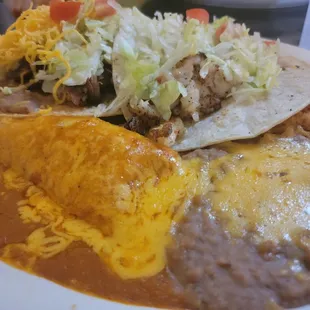 Lunch Special - Chicken enchilada, shrimp taco, carnitas tostado.