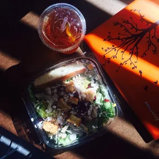 Big serving of chicken salad with a tall iced tea. Nice!