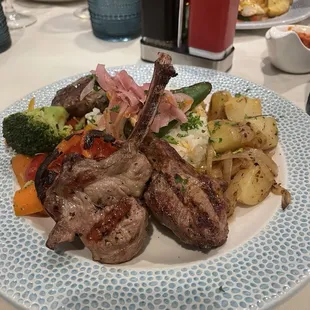 Lamb chops. So juicy and delicious.  Even the rice tastes great!