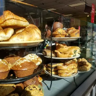 The sun highlights Cafe Zing&apos;s appetizing selection of baked goods.