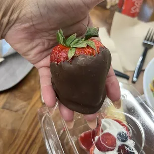 Fabulous chocolate covered strawberries. Look at their size!!!