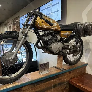 a motorcycle on display in a restaurant
