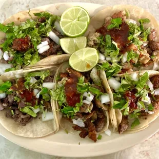 a plate of mexican tacos
