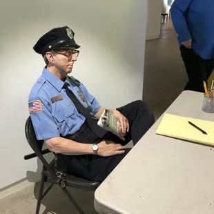 This is an art installation. I was fooled at first. So cool. Thought he was real.