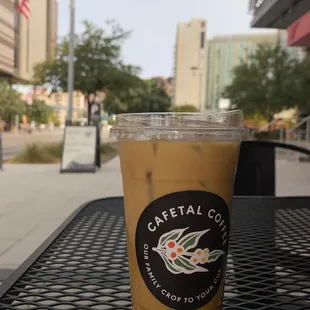 a cup of coffee on a table