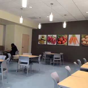 Cheerful spot with colorful wall art and huge picture windows.