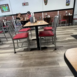 a woman sitting at a table