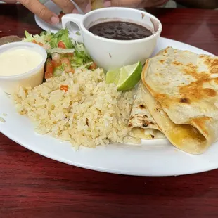 Shrimp quesadilla, rice and beans. In house made quesadilla shell, so good