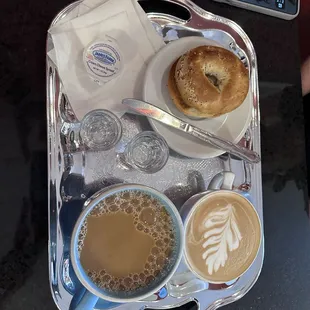 Large blend coffee and a black and gold latte