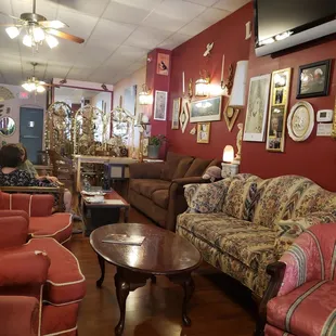 a coffee table and couches in a coffee shop