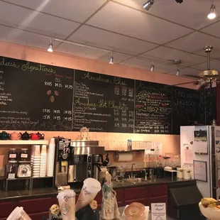 menus on the wall of a coffee shop