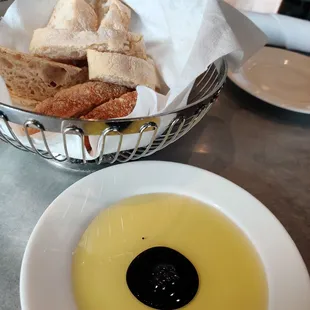 a bowl of soup and bread