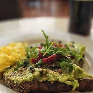 Avo toast, eggs and coffee.