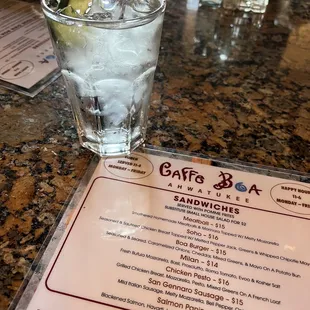 Menu and love that water comes with a cucumber!